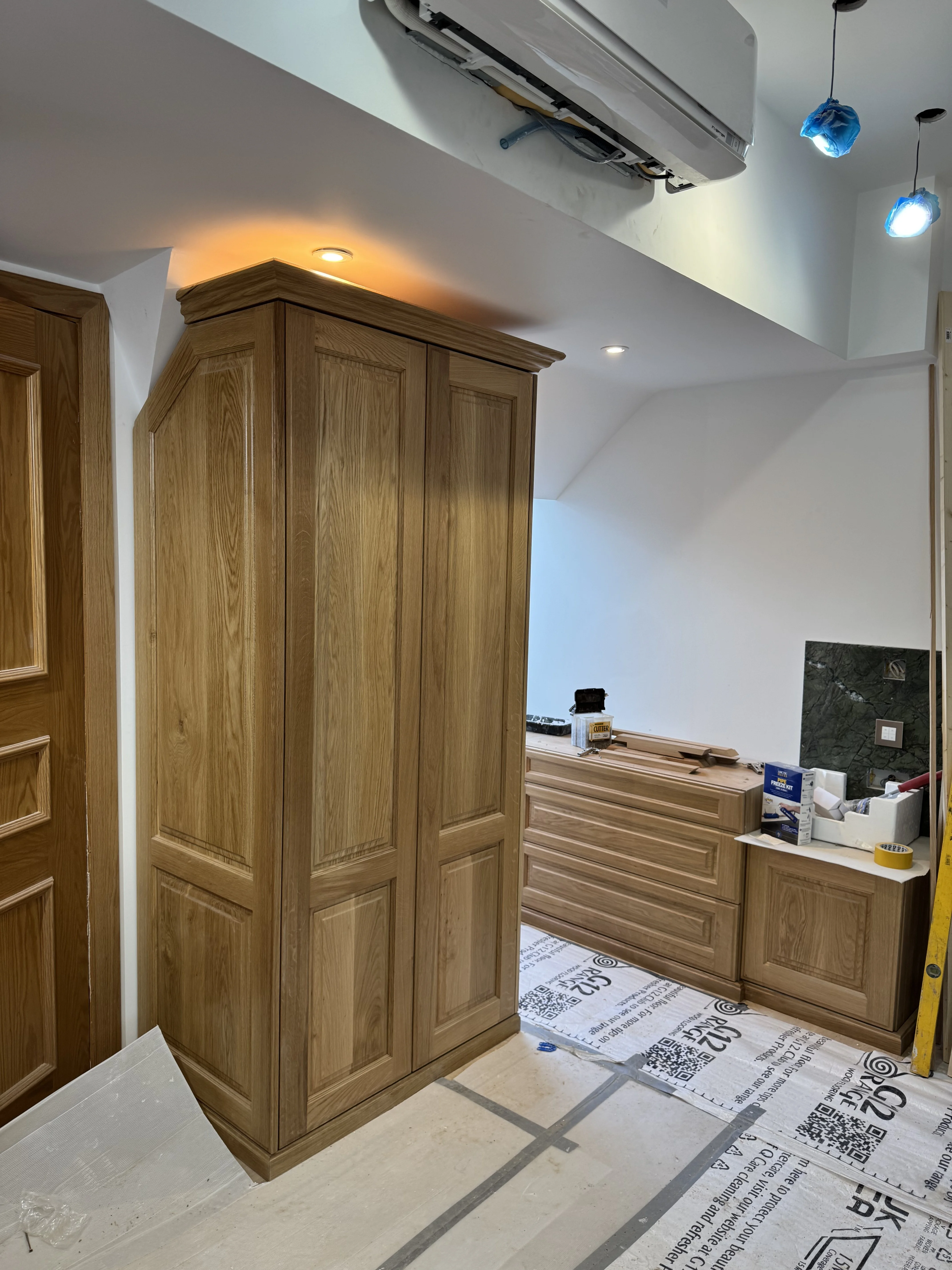 Bespoke solid oak fitted wardrobe installed in a Berkshire period property