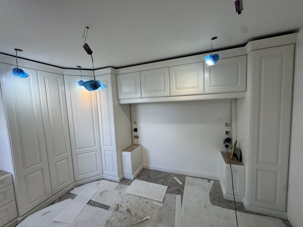 Painted shaker-door fitted wardrobes in a Bracknell bedroom