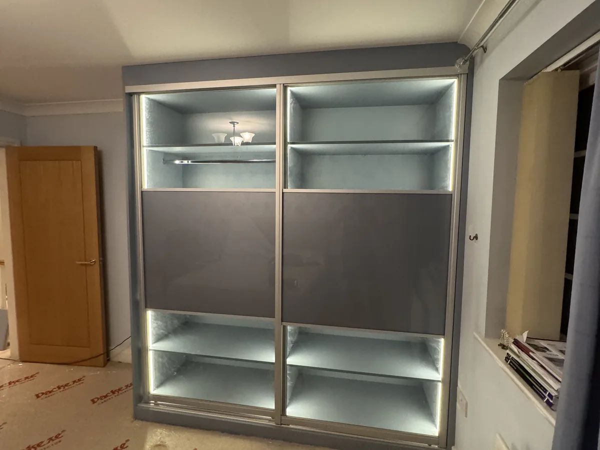 Bespoke fitted wardrobes installed floor-to-ceiling in a Bracknell bedroom