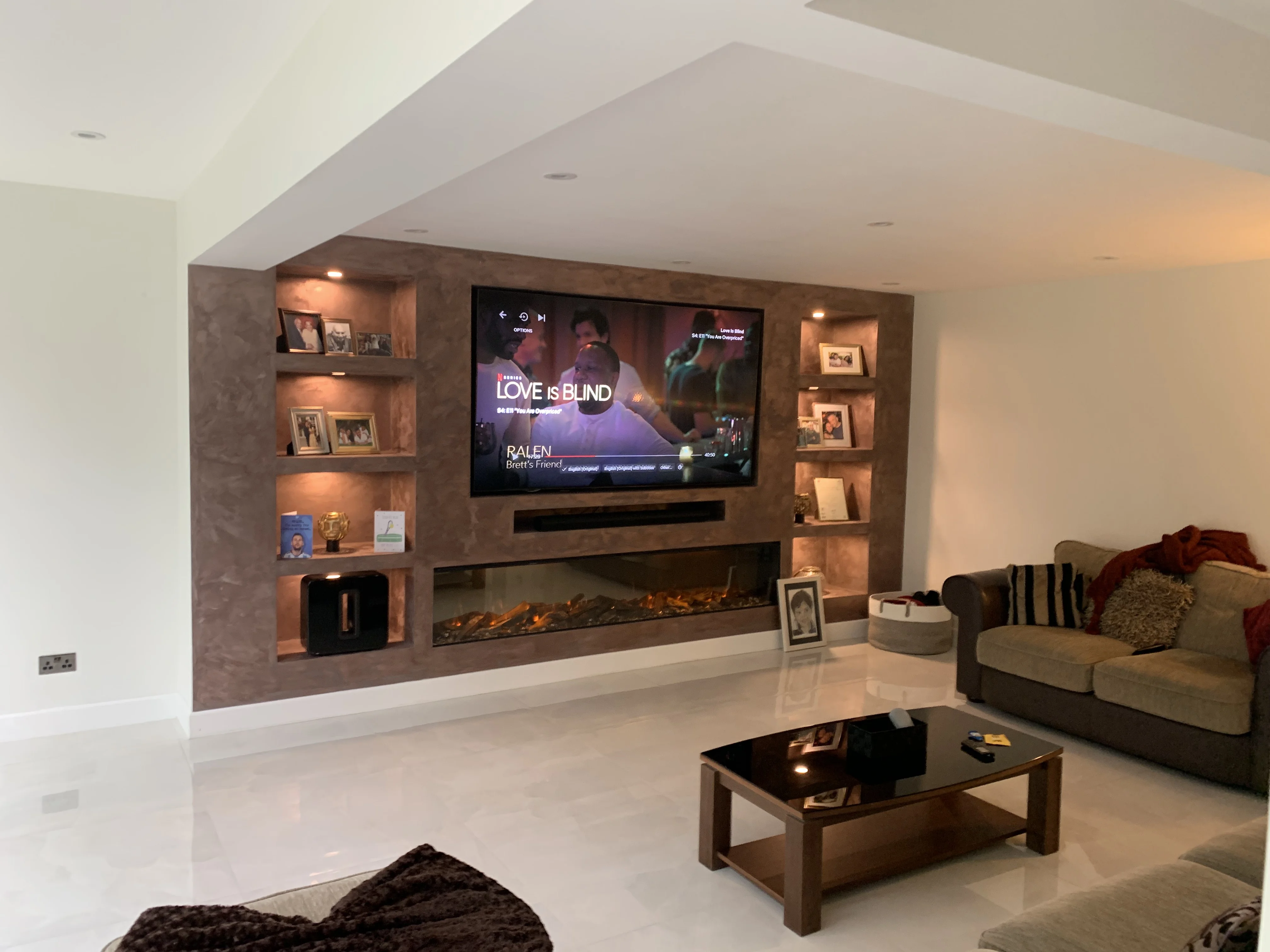 Bespoke media wall with integrated fireplace in a Berkshire property