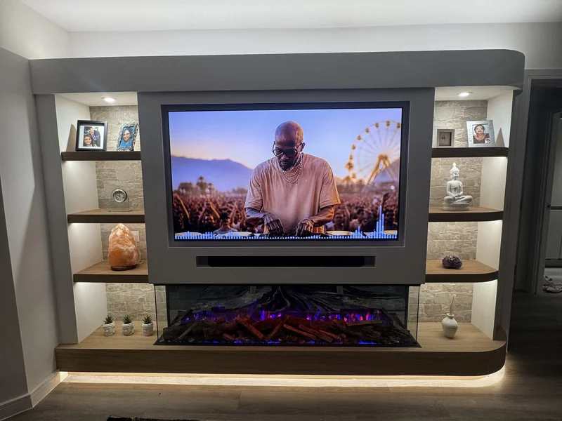 Bespoke media wall with integrated electric fireplace in a Berkshire living room