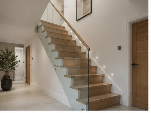 Oak staircase with frameless glass balustrade installed in a Berkshire home