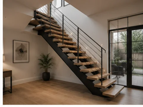 Open tread staircase with steel balustrade installed in a contemporary Berkshire home